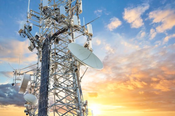 5G Sunset Cell Tower: Cellular communications tower for mobile phone and video data transmission