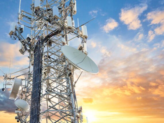5G Sunset Cell Tower: Cellular communications tower for mobile phone and video data transmission